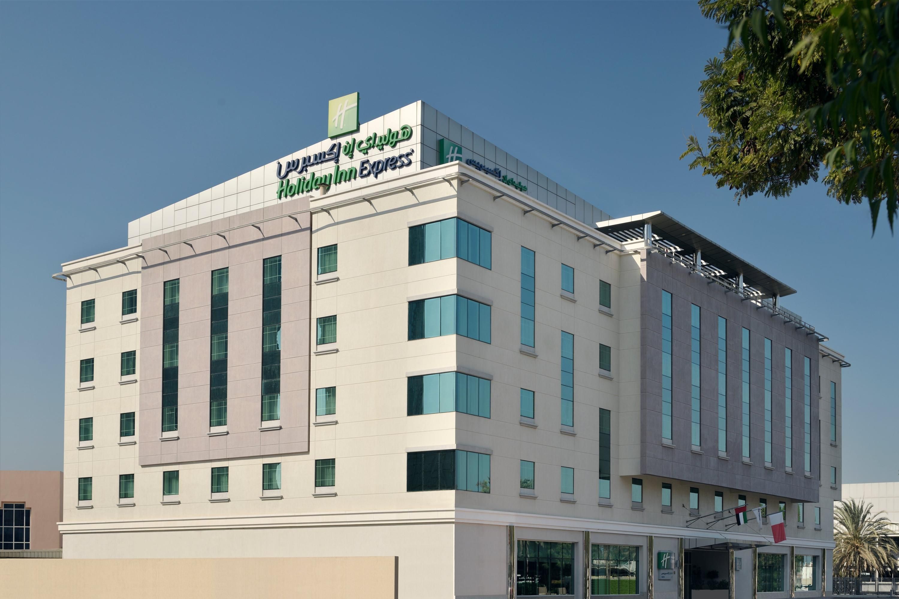 Holiday Inn Express Dubai hotel exterior with green signage