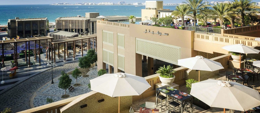 Sofitel Dubai Jumeirah Beach terraces and umbrellas at The Walk JBR