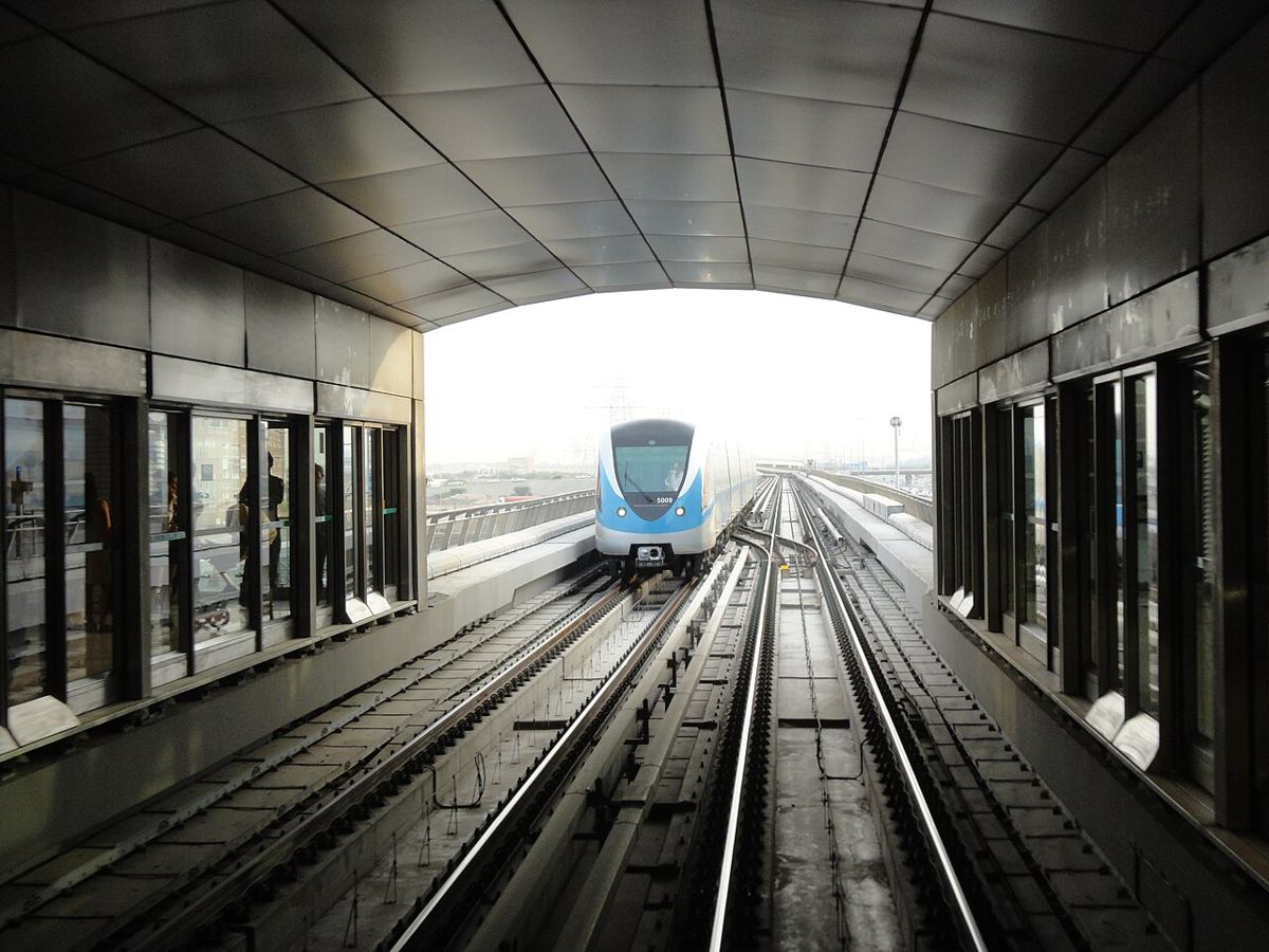 Dubai Metro train approaching an elevated station