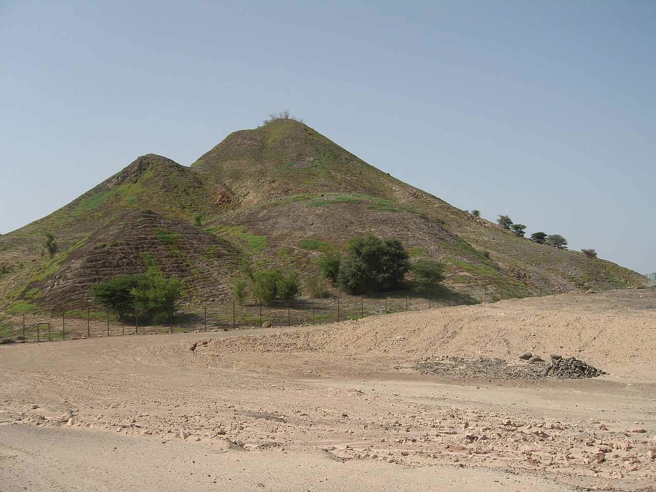 Rugged hill and sandy landscape on Sir Bani Yas Island